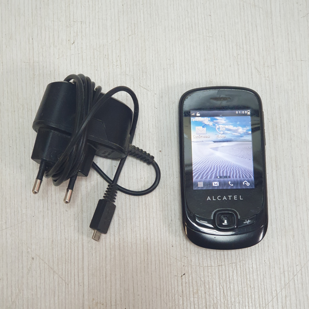 Мобильный телефон Alcatel One Touch 602, с зарядкой и в рабочем состоянии. Картинка 1